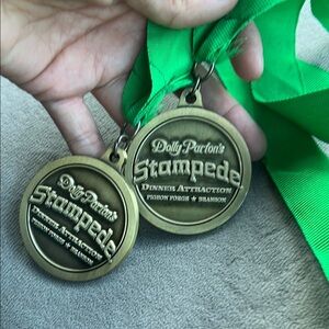 Dolly Parton's Stampede Medals with Green Ribbon